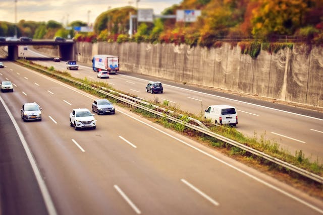 cars traveling on highway