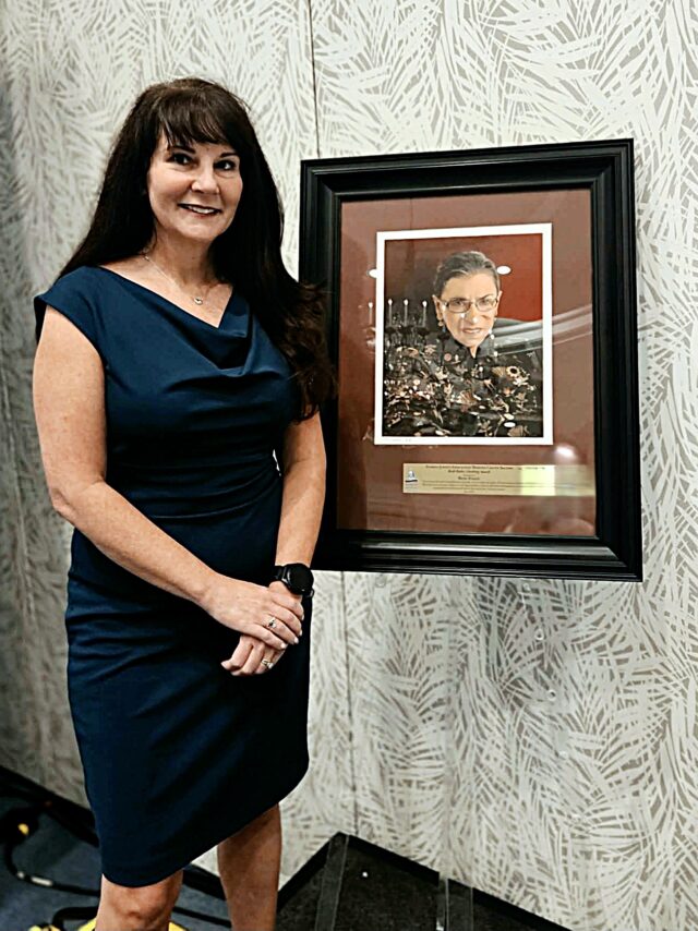 Beth with award
